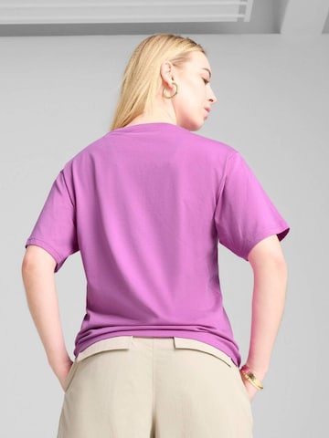 PUMA - Camiseta 'Puma Graphics Stacked No. 1 Logo Relaxed Tee' en lila