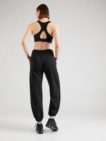 Effilé Pantalon 'Air' Nike Sportswear en noir