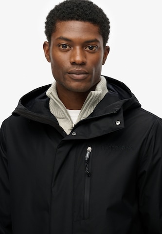 Parka mi-saison Superdry en noir