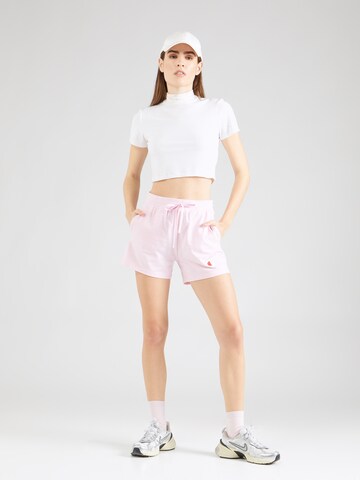 regular Pantaloni di Champion Authentic Athletic Apparel in rosa