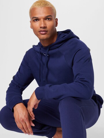 Sweat de sport UNDER ARMOUR en bleu