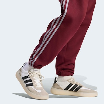 ADIDAS SPORTSWEAR Tapered Pants in Red