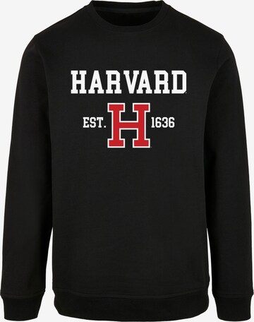 Merchcode Sweatshirt 'Harvard University - Est 1636' in Zwart: voorkant