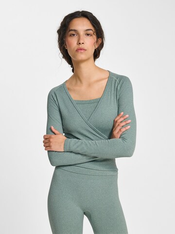T-shirt fonctionnel Hummel en vert : devant