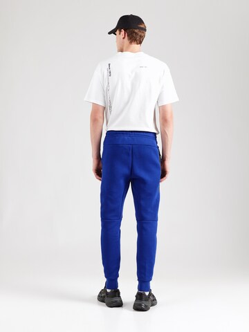 Nike Sportswear Конический (Tapered) Штаны 'TCH FLC' в Синий