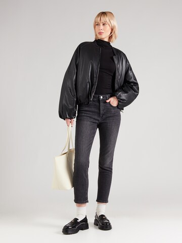 juoda VERO MODA Prigludęs Džinsai 'VMROSIE'