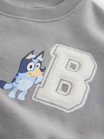 Next - Sweatshirt 'Bluey' em cinzento