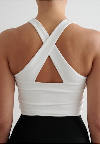 Bustino Reggiseno sportivo 'Essential' di Aim'n in bianco