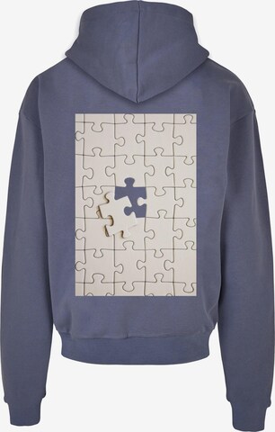 Merchcode Sweatshirt 'Missing Piece' in Blauw