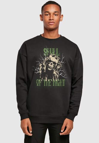 Sweat-shirt 'Halloween - Skull Of The Night V2' Merchcode en noir : devant