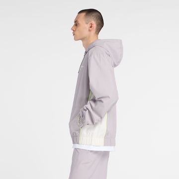 new balance Tussenjas 'Trackside Woven Jacket' in Grijs