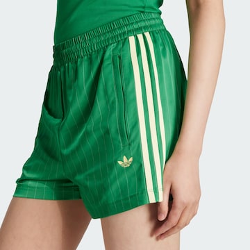 ADIDAS ORIGINALS Свободный крой Штаны в Зеленый