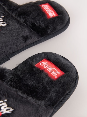 Next Hjemmesko 'Coca-Cola' i sort