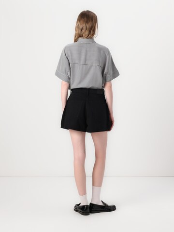 TOMMY HILFIGER Rozkloszowany krój Jeansy w kolorze czarny: tył