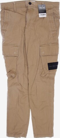 Calvin Klein Jeans Pants in 30 in Beige: front