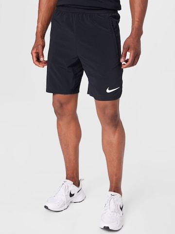 NIKE Regular Workout Pants in Black: front