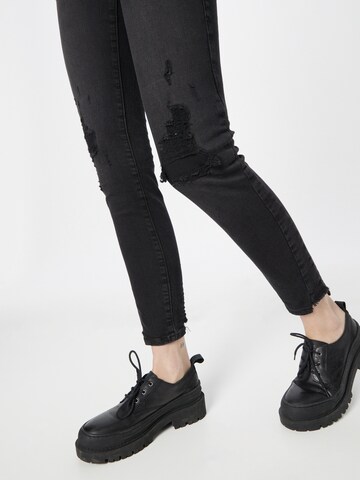 Slimfit Jeans 'HALLE' di True Religion in nero