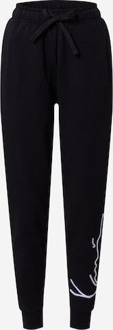 Karl Kani Tapered Pants in Black: front