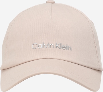 Calvin Klein Lippalakki värissä beige