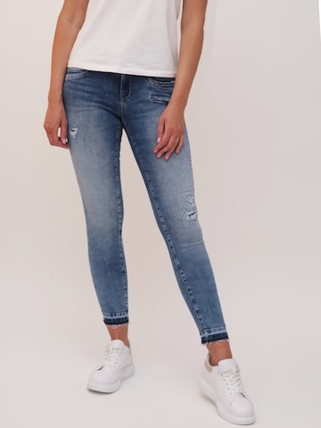 Miracle of Denim Skinny Jeans 'Suzy' in Blue: front