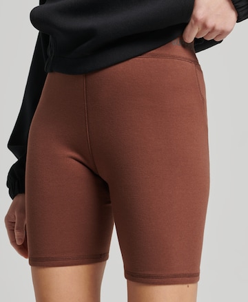 Superdry Skinny Workout Pants in Brown: front