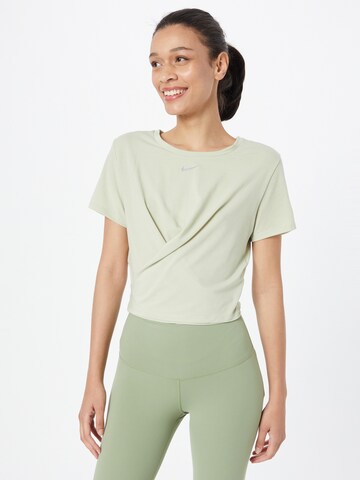 NIKE Performance shirt 'One Luxe' in Green: front