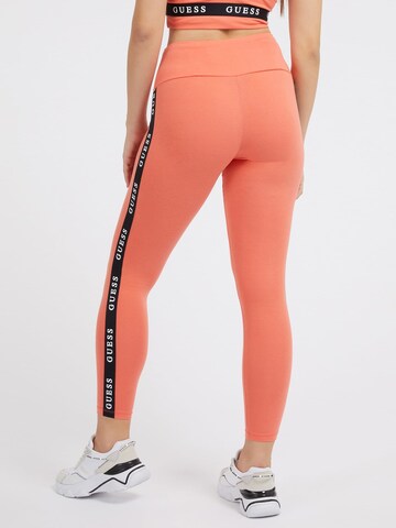 GUESS Skinny Workout Pants in Orange