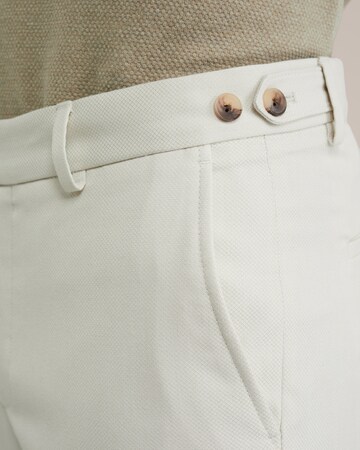 Slimfit Pantaloni con piega frontale di WE Fashion in beige