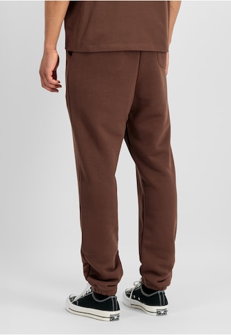 ALPHA INDUSTRIES Tapered Pants 'DTM' in Brown
