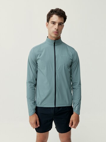 Born Living Yoga Between-season jacket 'Nyasa' in Green