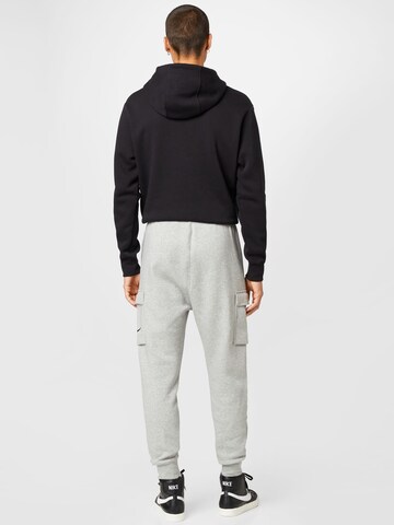 Tapered Pantaloni cargo di Nike Sportswear in grigio