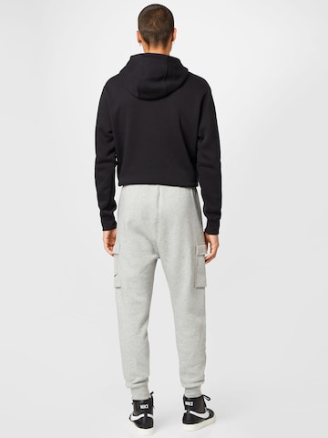 Effilé Pantalon cargo Nike Sportswear en gris