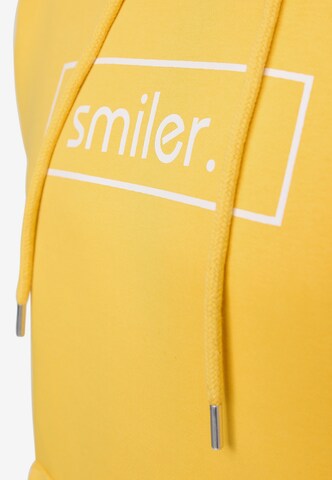 Sweat-shirt 'Happy' smiler. en jaune