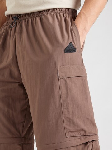 ADIDAS SPORTSWEAR Loose fit Outdoor trousers 'City Escape' in Brown