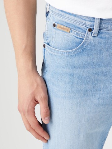 Slimfit Jeans 'Wrangler Texas Taper Lovesick W12TY728Q 112319945' di WRANGLER in blu