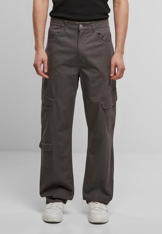 Karl Kani Regular Cargo Pants 'Og' in Brown: front