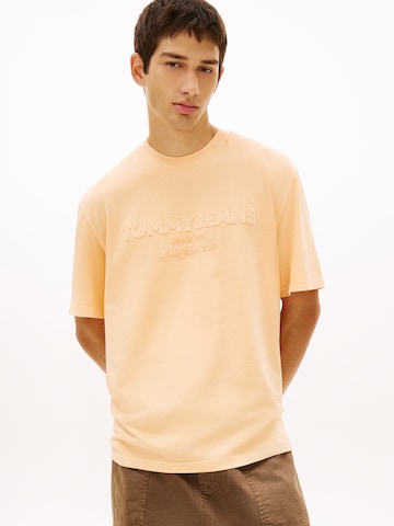 Tommy Jeans T-shirt '90S NEW CLASSICS' i orange: framsida