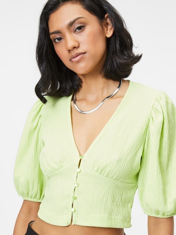 Monki - Blusa em verde