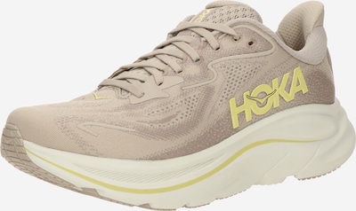 Bėgimo batai 'CLIFTON 10' iš HOKA, spalva – geltona / rusvai pilka, Prekių apžvalga
