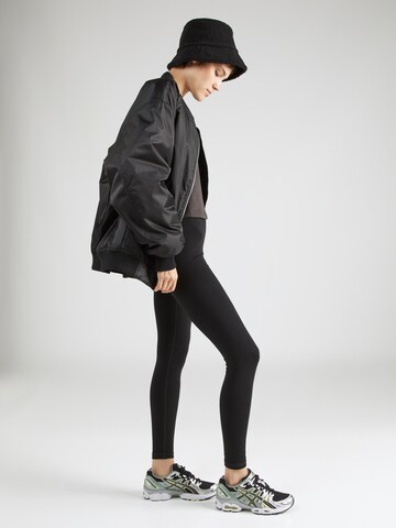 Superdry - regular Leggings 'ESSENTIAL' en negro