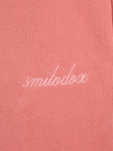 Loosefit Pantalon Smilodox en rose