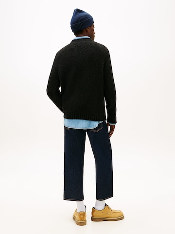 Pull-over Tommy Jeans en noir
