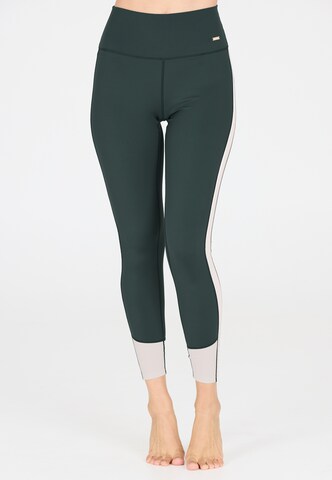 Athlecia Skinny Sports trousers 'Aspasia' in Green: front