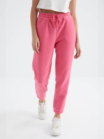 Pantaloni sportivi di Tommy Life in rosa: frontale