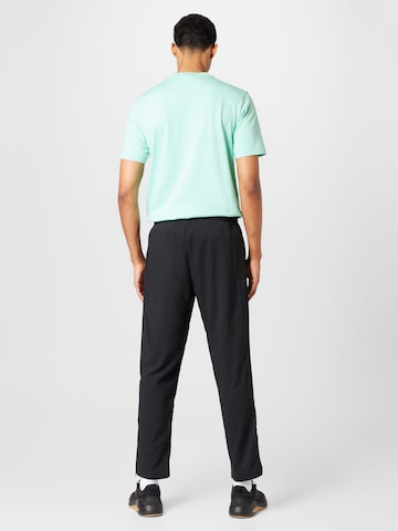 ADIDAS SPORTSWEAR Дънки Tapered Leg Спортен панталон 'Essentials Stanford' в черно