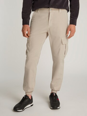 Tommy Jeans Tapered Cargo trousers 'RYAN' in Beige: front