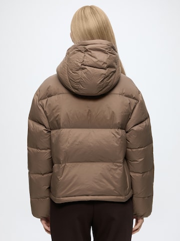 Calvin Klein Jeans Vinterjacka 'ESSENTIAL' i brun