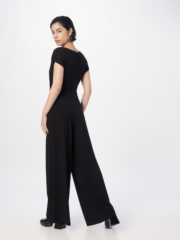 Tuta jumpsuit 'Insa' di ABOUT YOU in nero