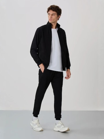 Tommy Life Tracksuit 'Aktive Sets' in Black: front