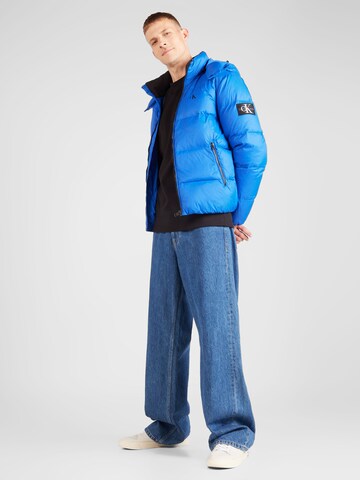 Calvin Klein Jeans Téli dzseki 'ESSENTIAL' - kék